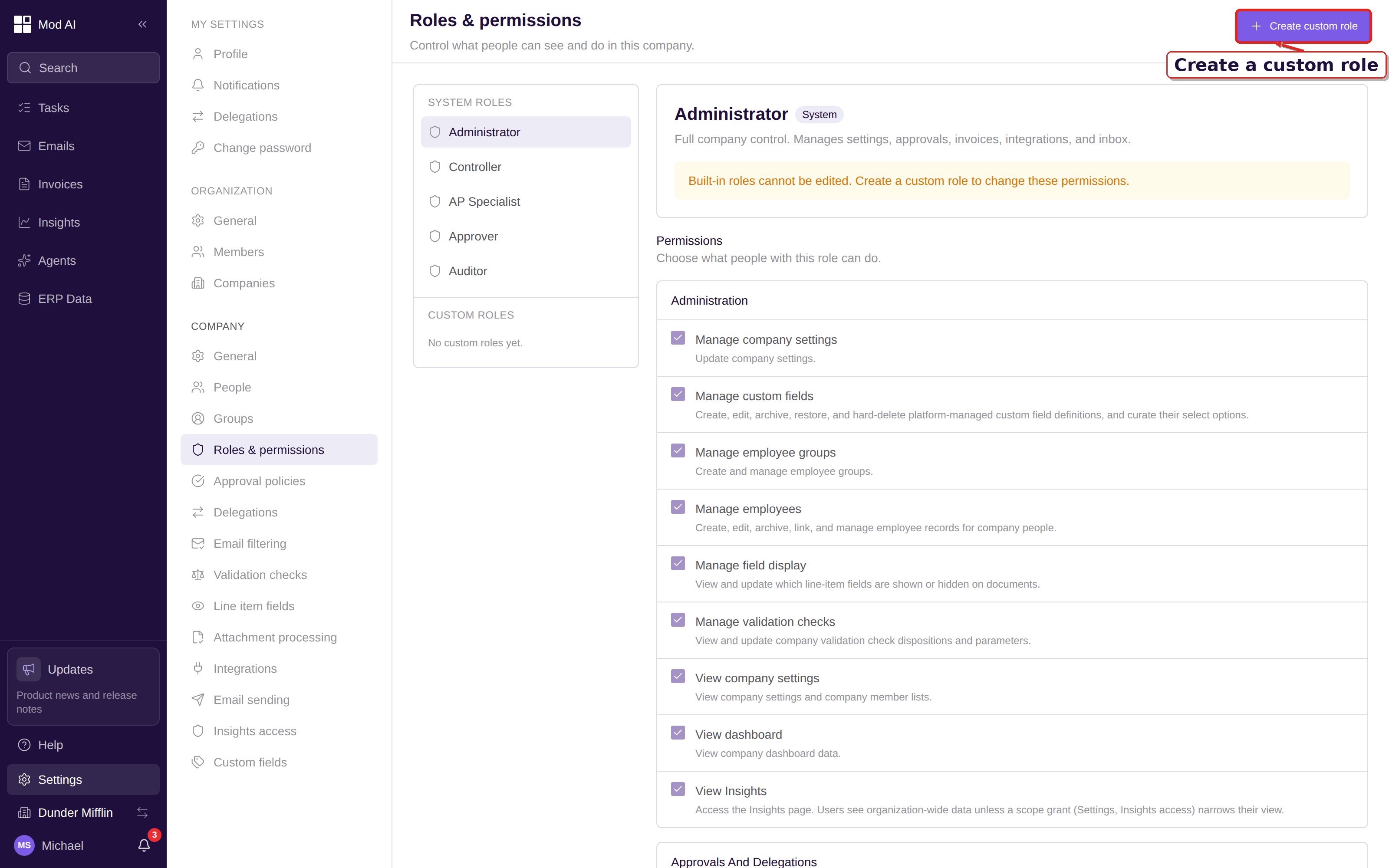 Roles and permissions page with system roles and the Permissions matrix